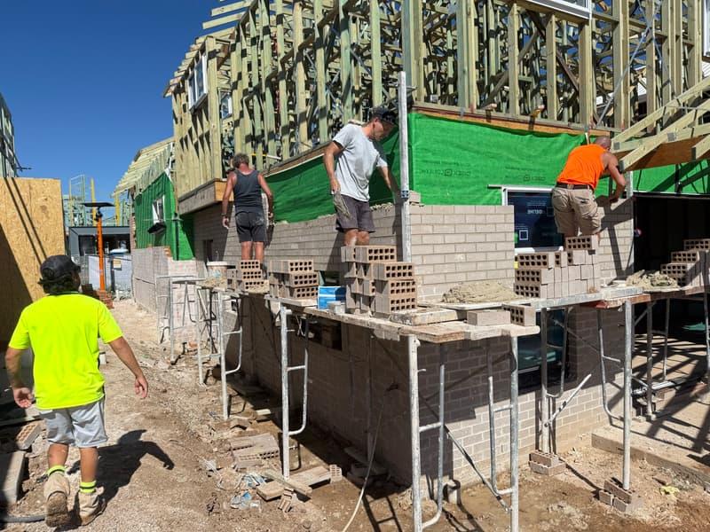 Bricklayers on the tools